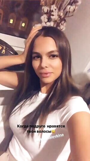 Oksana playing with her hair