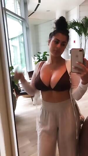 Persian Girl Showing off Her Massive Cleavage