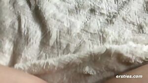 Playing with herself.