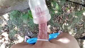 Milking my cock outdoors.